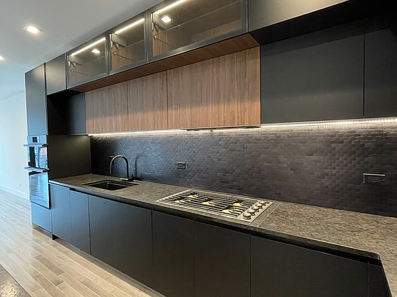 Glass front display cabinetry with back lighting