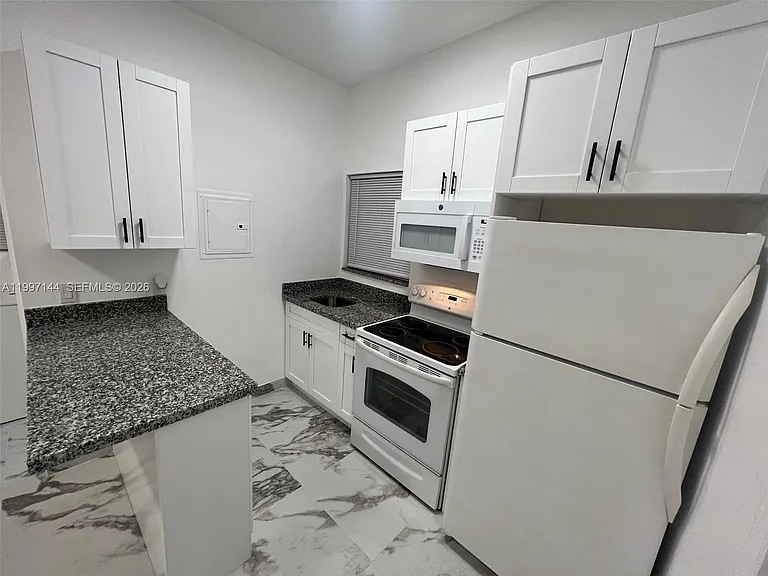 1720 NW 180th Ter #1 — Photo 7