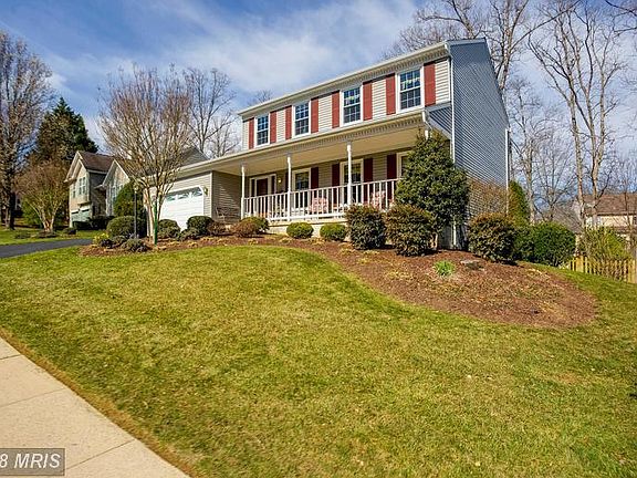 Professionally-landscaped lot with sprinklers