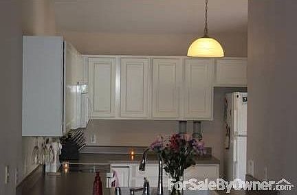 Kitchen
						:
						View into the kitchen from the living room.