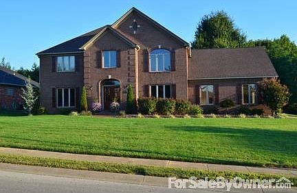 Front View
						:
						Double front glass entry doors, wood shutters.