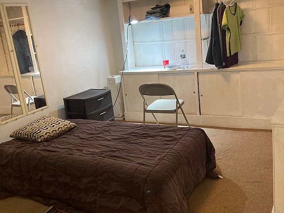 twin size bed/wall unit for clothing multi purpose u it/ no furniture needed