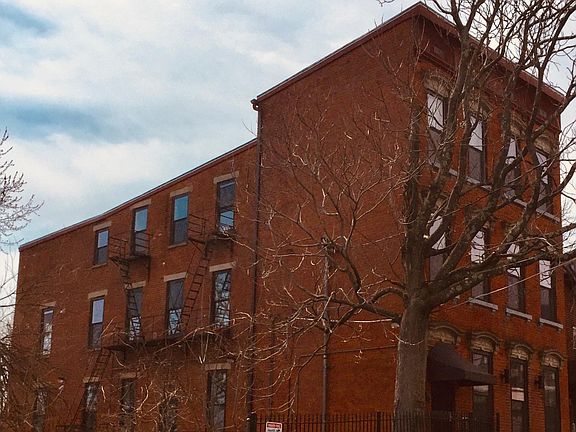 Turn of century building, completey gutted & renovated, on quiet street next to God's Bible College Campus, Channel 12, and Filson Park.