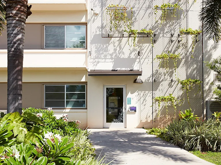 WakeaGardens_Exterior_EntranceWithGreenscapedWall