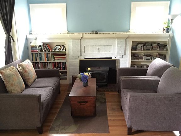 living room with built-in shelves