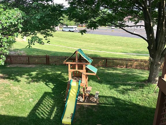 Fenced Yard Overlooking Greenspace & Mature Trees