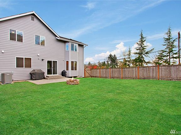Large fully fence yard with firepit.  Community Open Space on one side adds extra openness & privacy