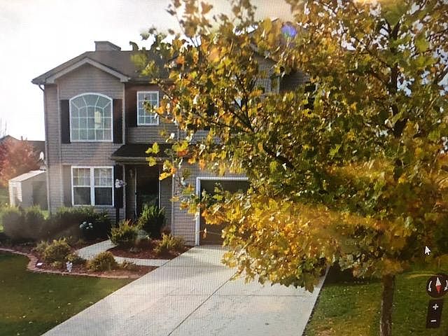 TWO STORY - TWO CAR GARAGE