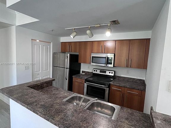 5th image of 5980 W Sample Rd APT 301