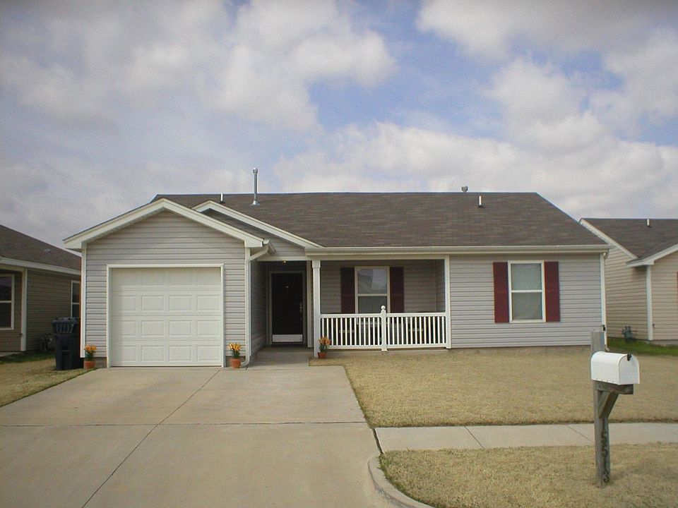 Charming curb appeal with covered porch