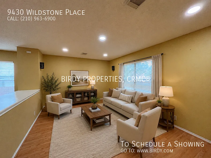 "Spacious 4-Bedroom Sanctuary with Fireplace at 9430 Wildstone Place!" — Photo 3