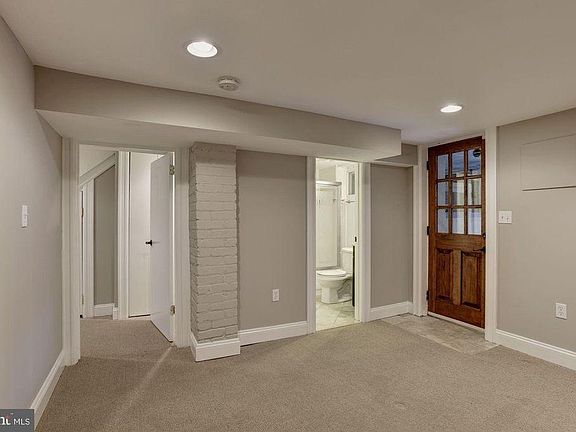 Bedroom and exterior entrance. Ensuite bathroom also opens directly into living area