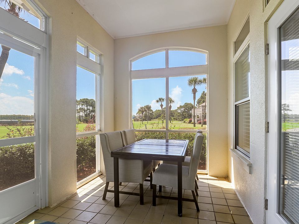 Enclosed Patio Overlooking Golf Course & Bay