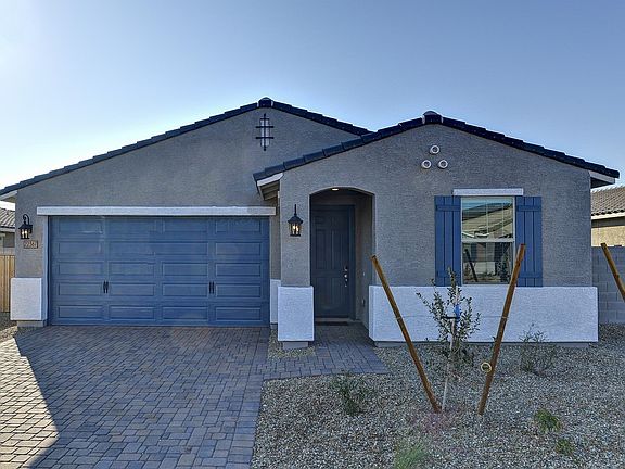Move into the Leslie floorplan at 22367 W Hopi Street at Coyote Ridge.