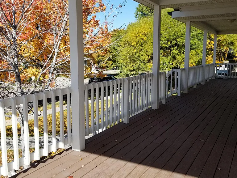 Front wrap around covered deck.