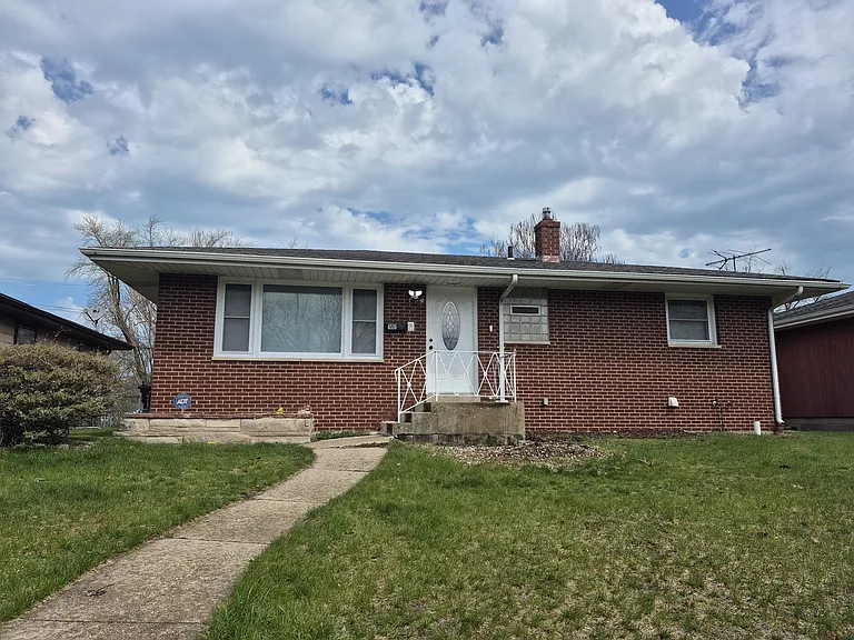 6516 E 3rd Pl — Photo 1