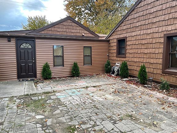 Enclosed front porch breezew