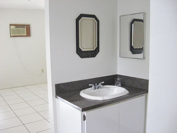 Sink are leading to bathroom.