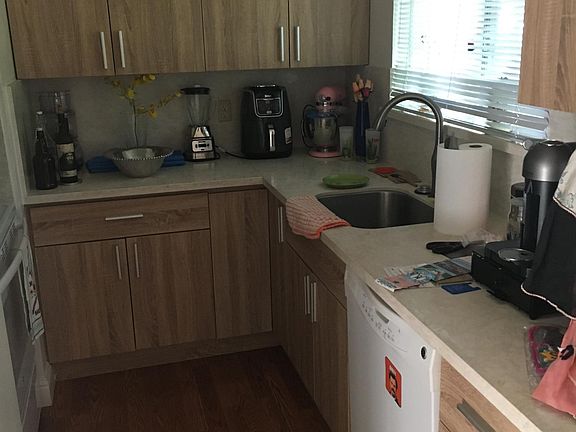 Brand new quartz countertops, laminate flooring