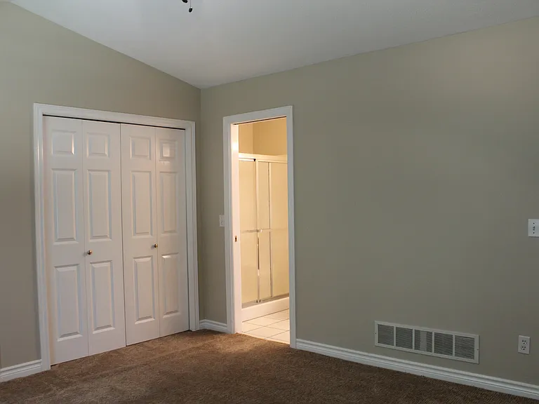 Master bedroom and door to bathroom