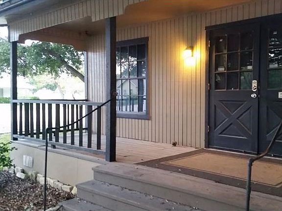 Rustic hand railing and posts off the Front Porch.
