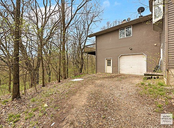 Side load attached 4th car heated garage w/access to walk out basement!