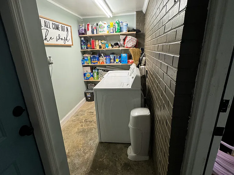 LAUNDRY ROOM WITH ADDITIONAL BUILT-IN STORAGE