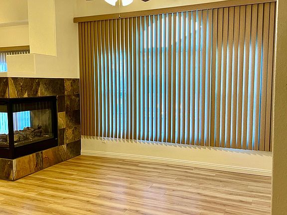 Blinds open from center.
