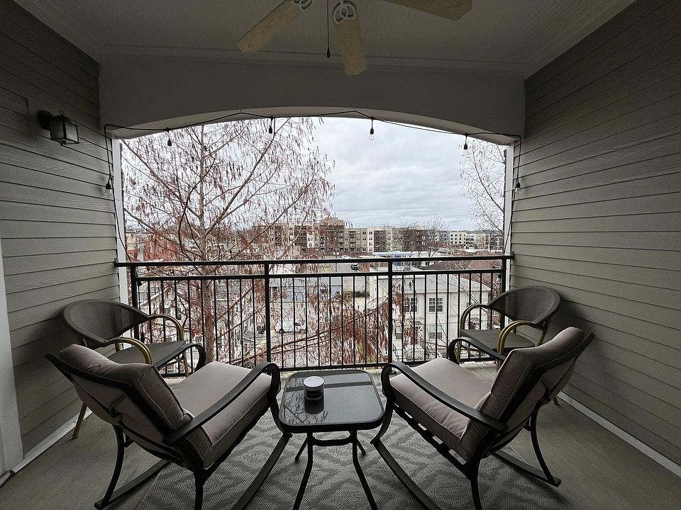 Outdoor patio, very spacious, shaded with fan and lights.