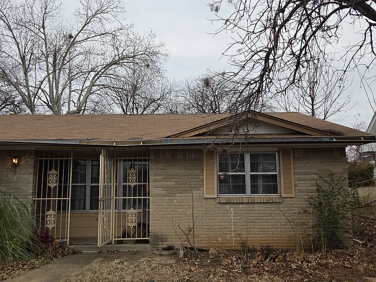 Front view. Big tree is now gone.