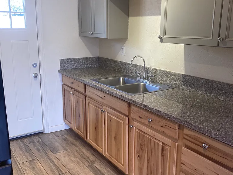 deep heavy stainless sink with quality fixtures... Diamond cabinets