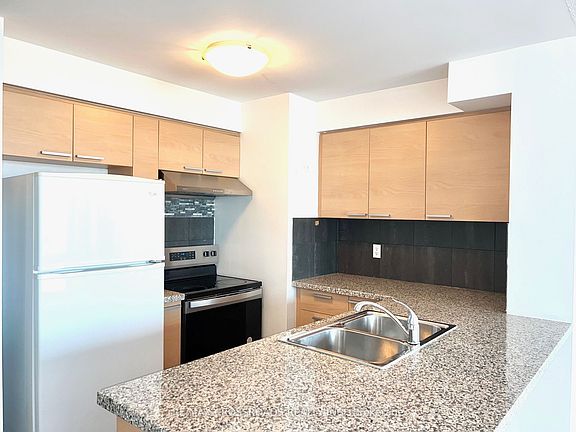 3rd image of 16 Harrison Garden Blvd #Penthouse 10