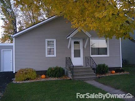 View from front sidewalk
						:
						New siding, doors, insulation, and some windows!