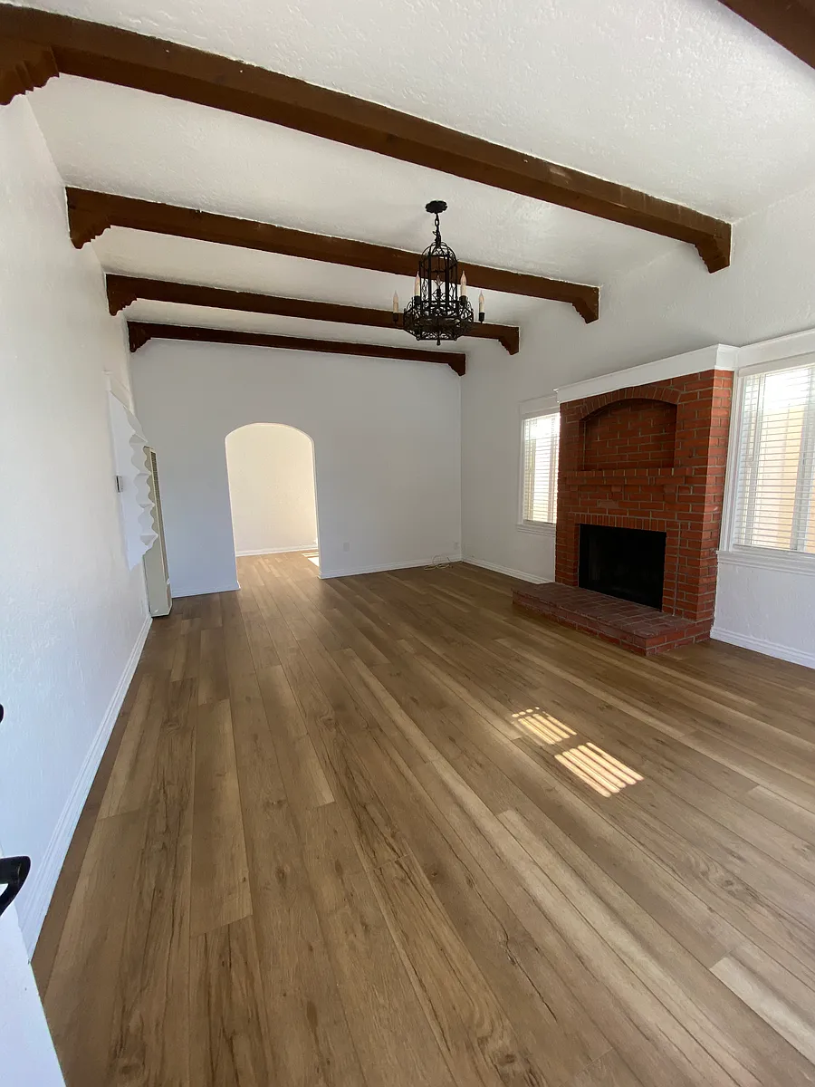 Living room - fireplace has gas log igniter - window to right of fireplace has ocean view - 122 Gull St