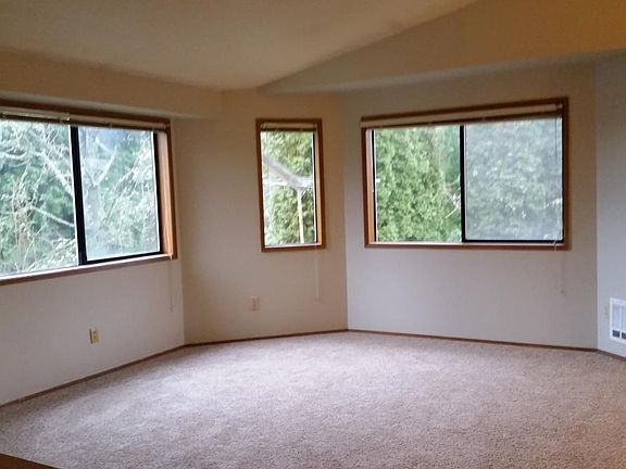 Vault Ceilings and lots of natural light throughout the unit. Upstairs living space