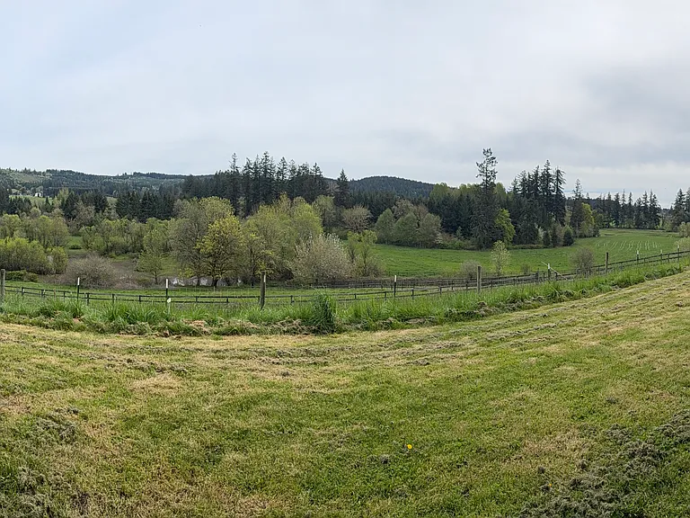 Spring view of pastures and hayfields below