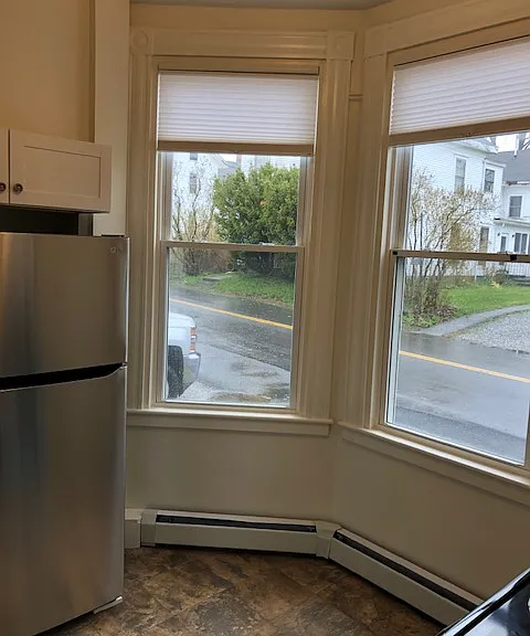 Kitchen With Large Windows Allowing Plenty Of Natural Sunlight