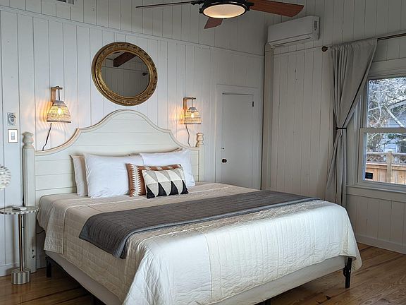 The master bedroom features King bed with a memory foam mattress