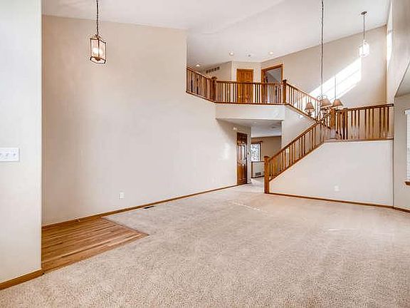 Dramatic Staircase leading to 2nd floor bedrooms and loft