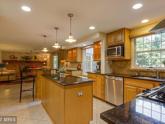 Updated kitchen tastefully appointed with granite.