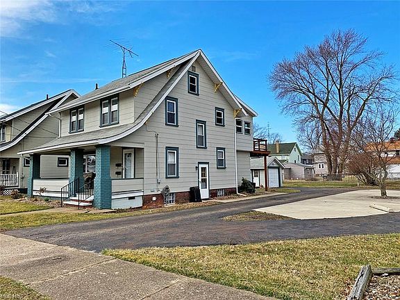 Front door has interior stairs that lead to the upstairs unit. Side door leads to shared basement with separate laundry. Rear stairs up to deck lead to second entrance to upstairs unit.