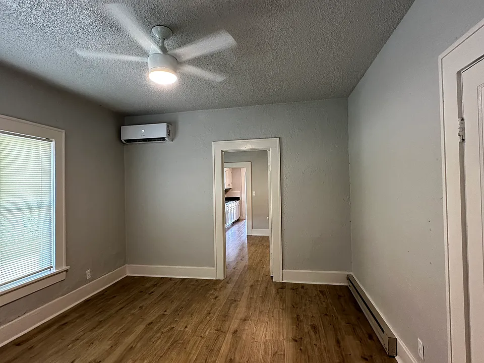Bedroom (facing kitchen, back of house)