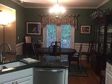SS Dish Washer and Dining room and double doors to 12 x24 cedar deck