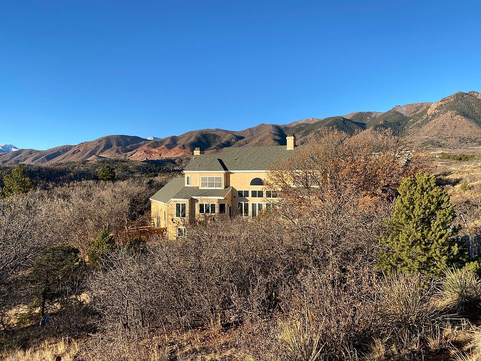 Sitting on 5.22 acres, no neighbors for 4 acres behind to enjoy the views through expansive windows.