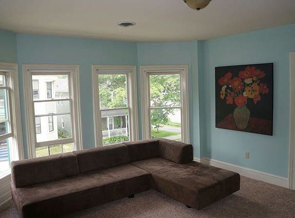 Cozy living room with tons of natural light.