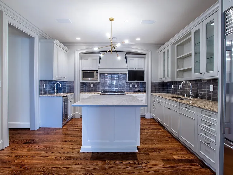 Island Kitchen with breakfast bar, second sink & wine cooler & large Pantry.