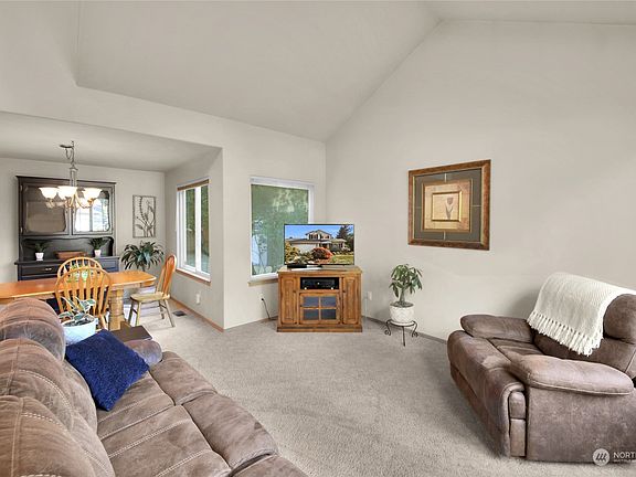 Living room with attached dining room>