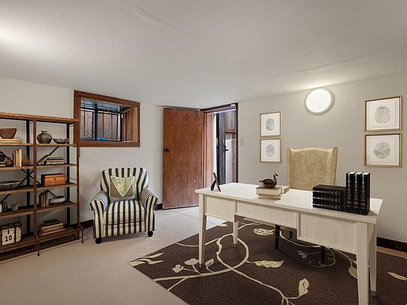 Large basement space for an office, den, play room or reading room. Make this space whatever you want it to be!

(Furniture added digitally)