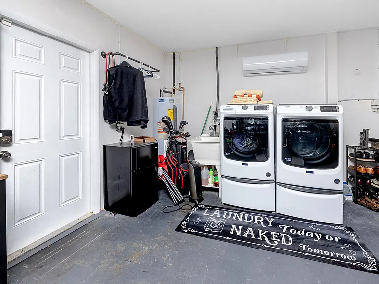 12103 71st Way - Washer and dryer and AC unit in garage