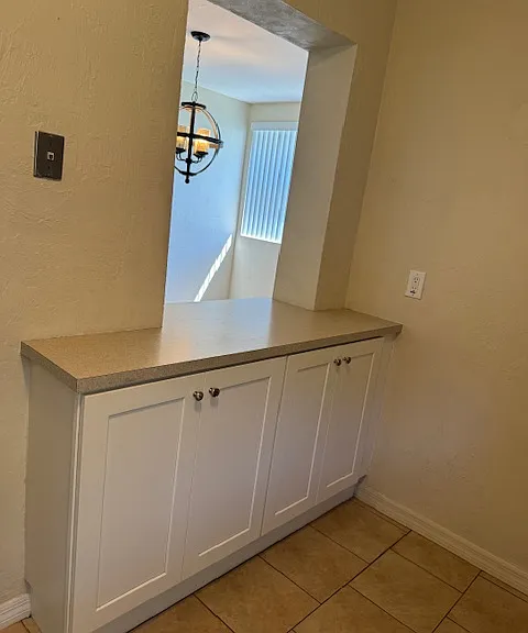 Kitchen opening to dining room